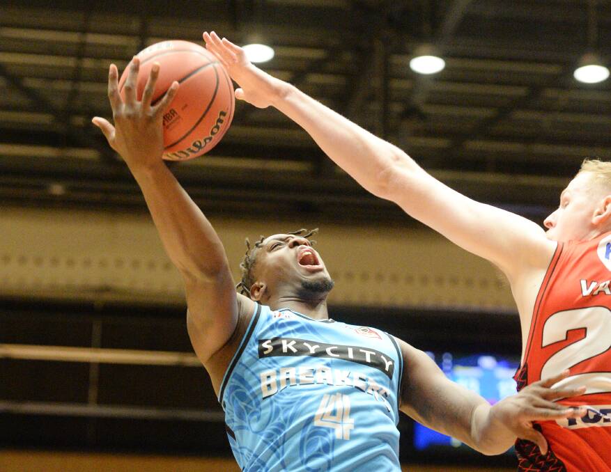 NOT TODAY: New Zealand Breakers' guard Armani Moore has his shot blocked by Rhys Vague.