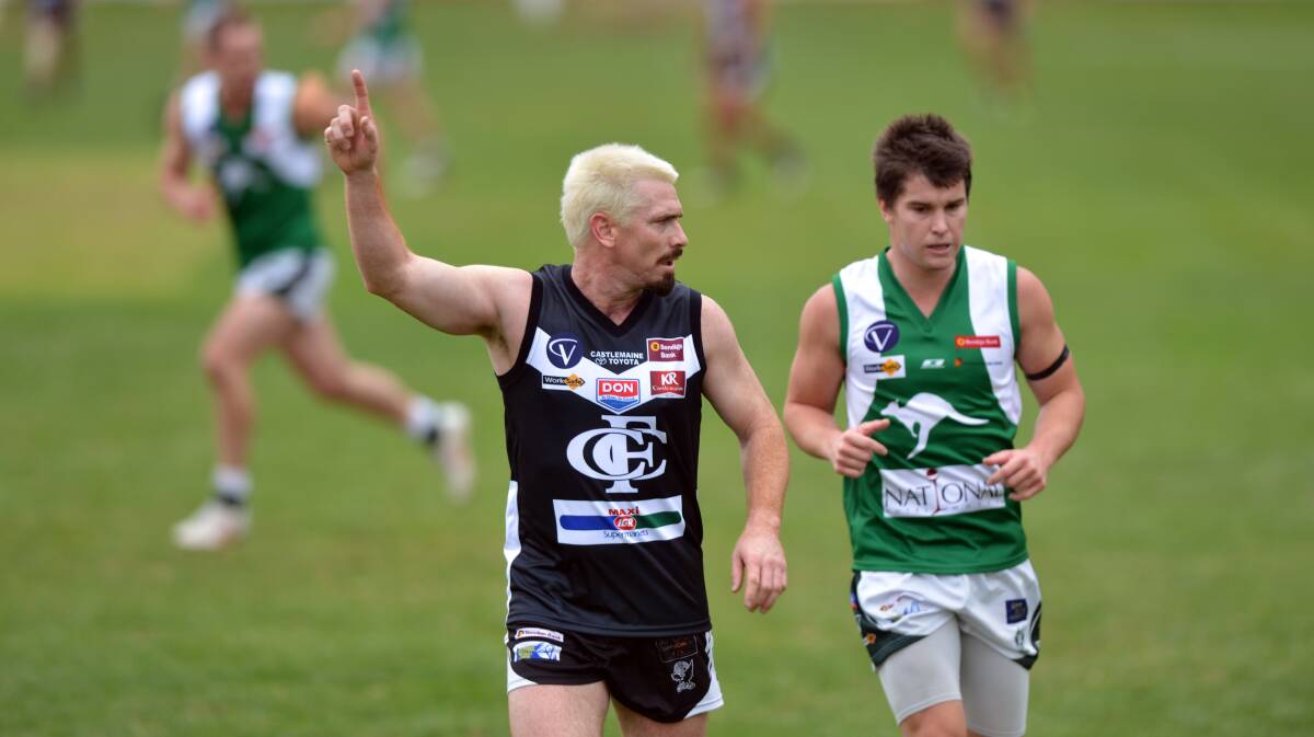 Jason Akermanis calls for the ball against the Roos.