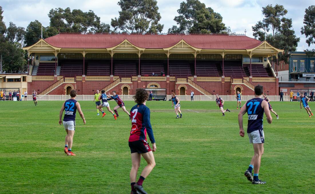 Sandhurst and Eaglehawk do battle in front of an empty QEO grandstand. Picture: PETER WEAVING