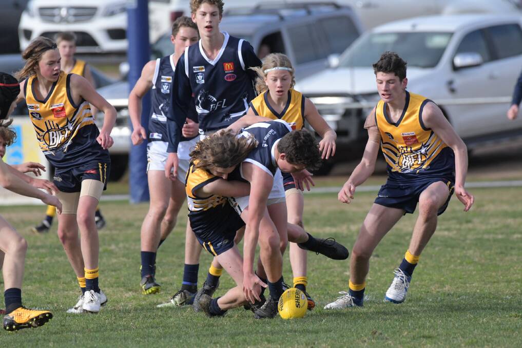 CRUNCH: The Bendigo under-14s kept the pressure on their Ballarat opponents.
