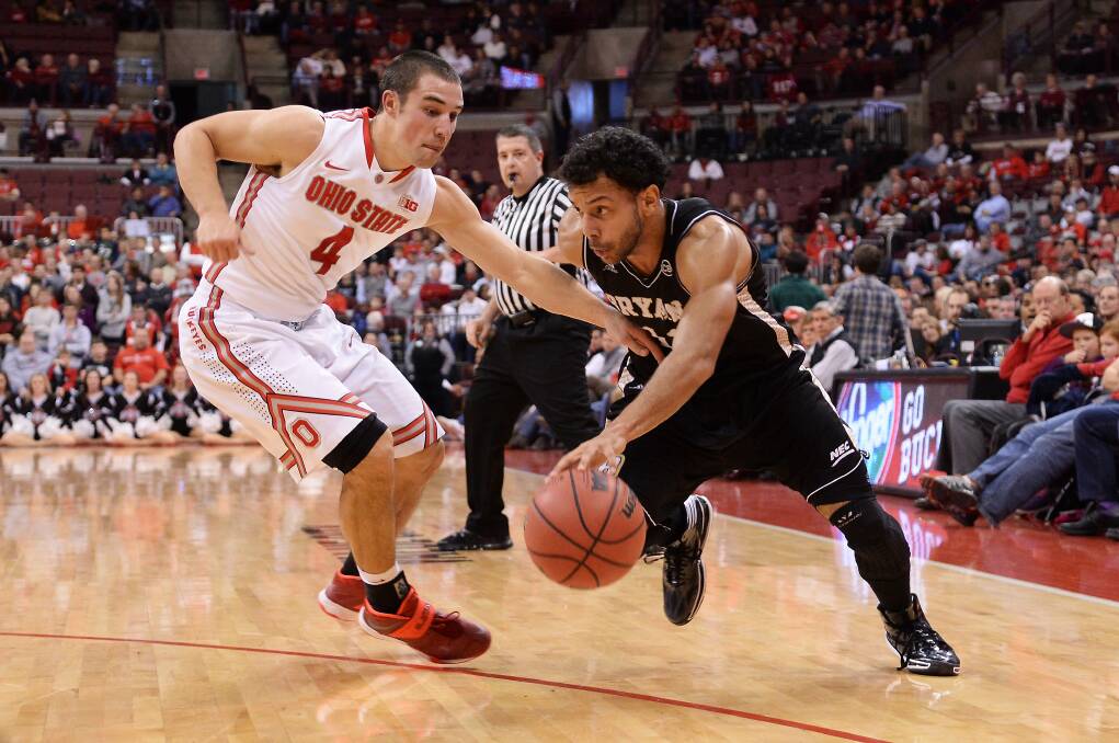 New Bendigo Braves recruit Dyami Starks drives past Ohio State's Aaron Craft. Picture: GETTY IMAGES