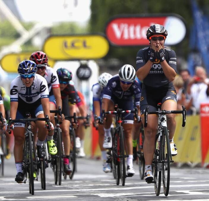 EMOTIONAL VICTORY: Bendigo-born Chloe Hosking crosses the finish line to win the La Course by Le Tour in Paris. Picture: GETTY IMAGES