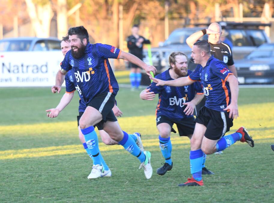 Brent Hamblin celebrates after scoring a late goal for Eaglehawk in its 3-2 win on Sunday. Picture: ADAM BOURKE
