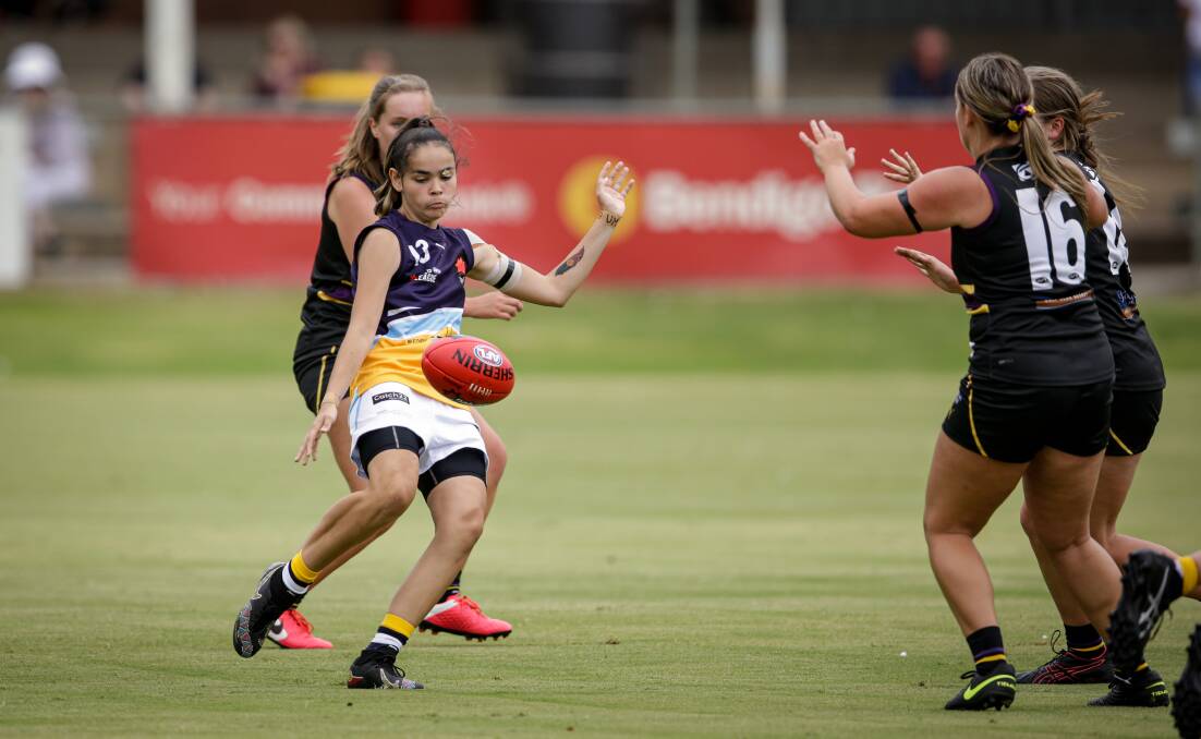 Chantelle Mitchell gets a kick away for the Pioneers. Picture: JAMES WILTSHIRE, BORDER-MAIL