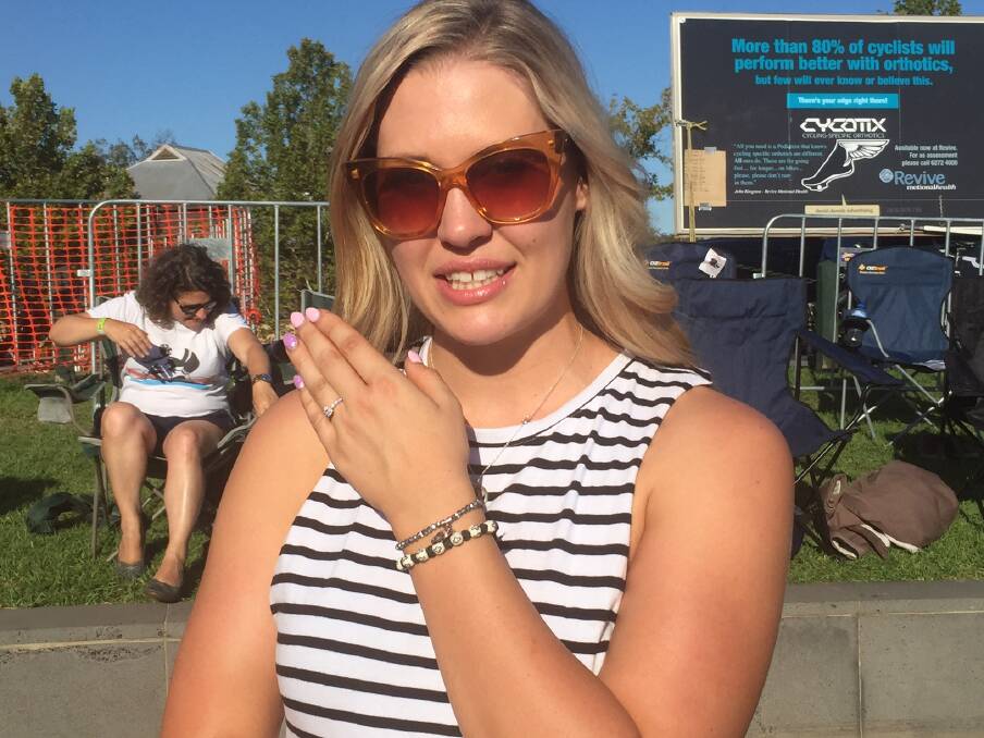 BEAMING: Imogen Jelbart shows off her engagement ring.