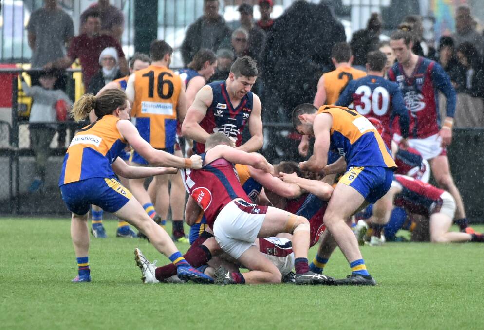 Golden Square and Sandhurst players had several "tests of strength" in Sunday's elimination final. Picture: GLENN DANIELS