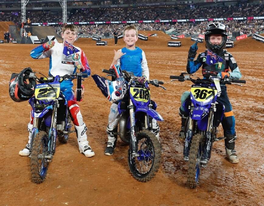 Nate Hargreaves, middle, after finishing second in the YZ65 Cup at Marvel Stadium. Picture contributed