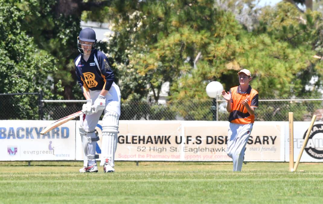 MIXED EMOTIONS: Goulburn Murray under-16s celebrate the wicket of Bendigo's Louis Banfield at Canterbury Park. Pictures: NONI HYETT