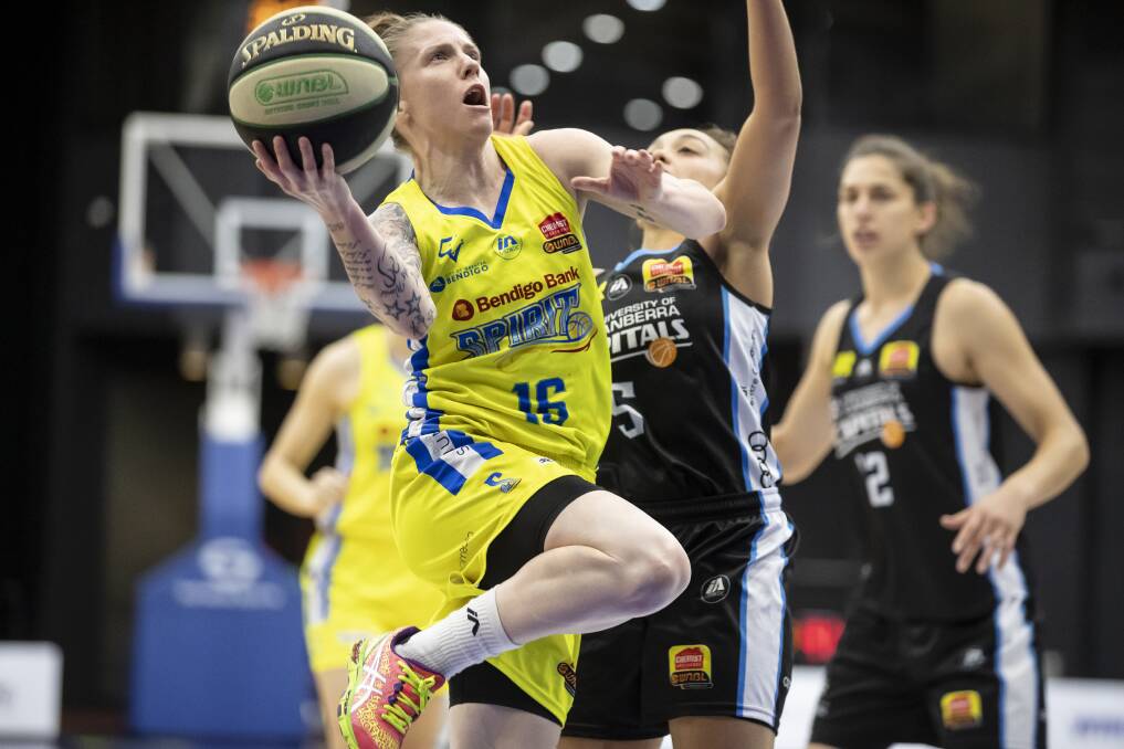 ATHLETIC: Bendigo Spirit guard Nat Hurst drives to the basket in Canberra on Sunday. Pictures: SITTHIXAY DITTHAVONG