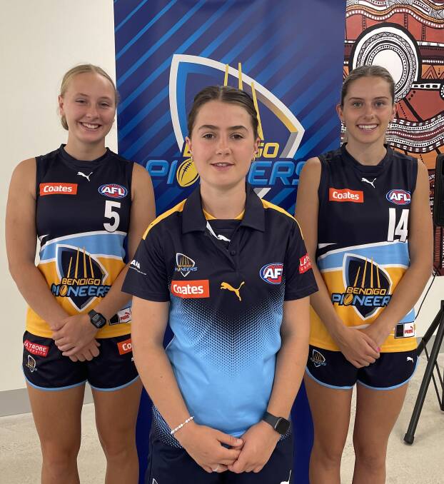 Lou Painter, Lila Keck and Bryde O'Rourke in the Pioneers' new home jumper and polo shirt.