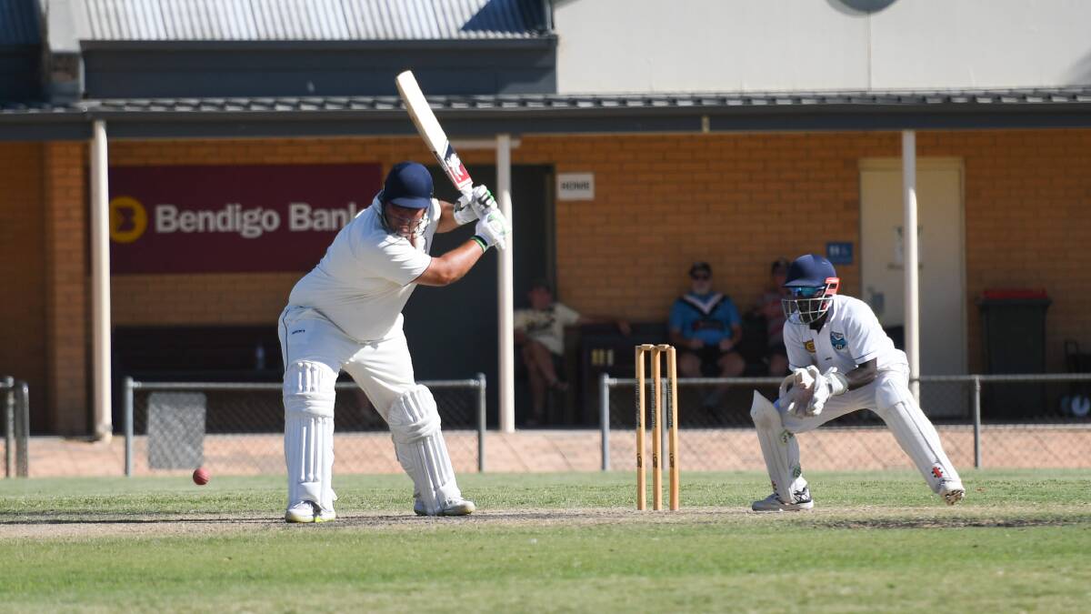 Ash Gray looks to launch a ball into the outfield. Picture: ADAM BOURKE