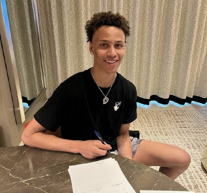 MIXED WEEKEND: Dyson Daniels after signing his first NBA contract with the Pelicans over the weekend. Picture: NEW ORLEANS PELICANS