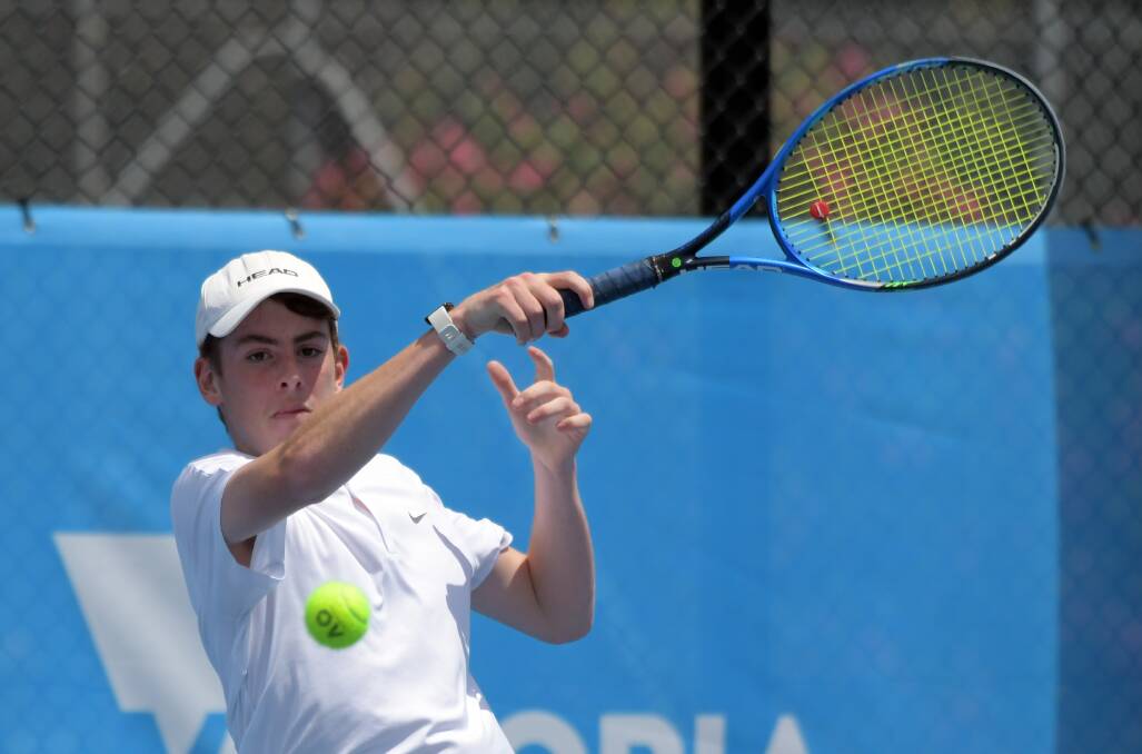 WELL PLAYED: Strathfieldsaye's Lachlan Perdon blasts a forehand in Saturday's Premier League action.