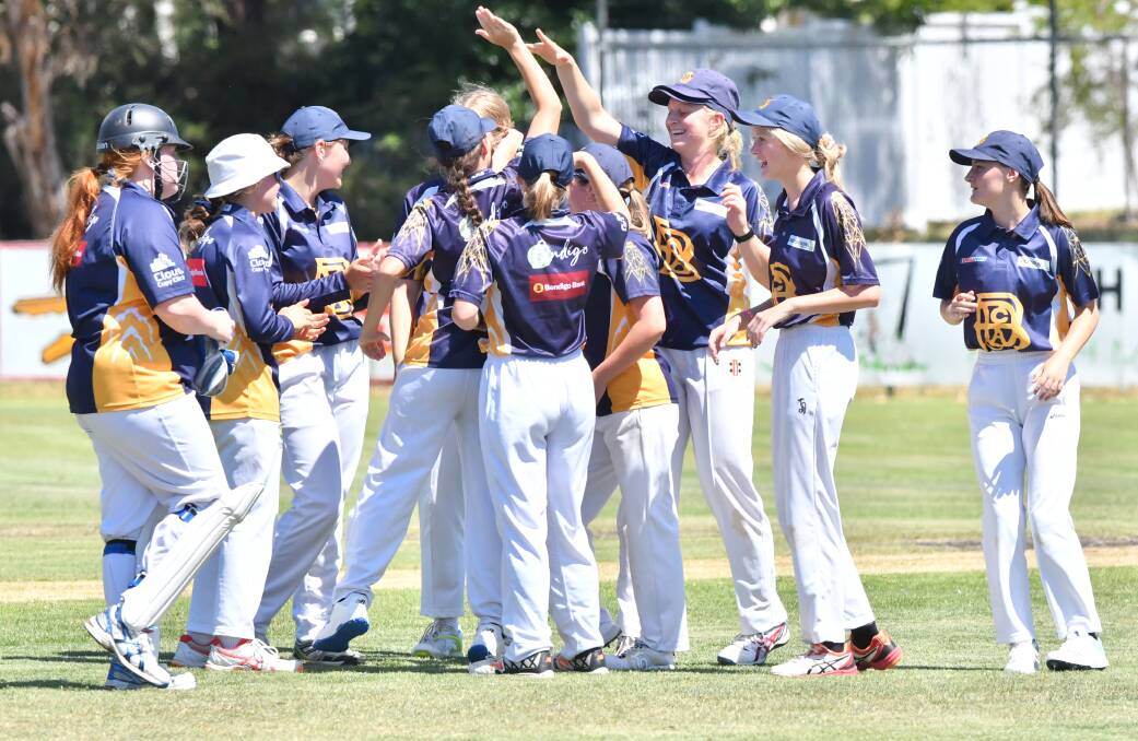 HANDS UP WHO WON?: Bendigo under-17 players cleebrate a wicket in the grand final against Shepparton. Picture: NONI HYETT