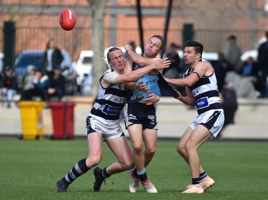 Action from the 2019 BFNL grand final between the Storm and Hawks.