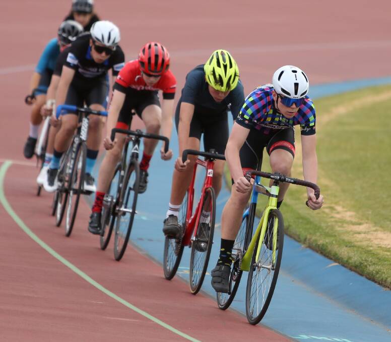 SPEED DEMONS: Junior racing is a major part of the Bendigo Cycling Club's Thursday night summer season. Picture: DION JELBART