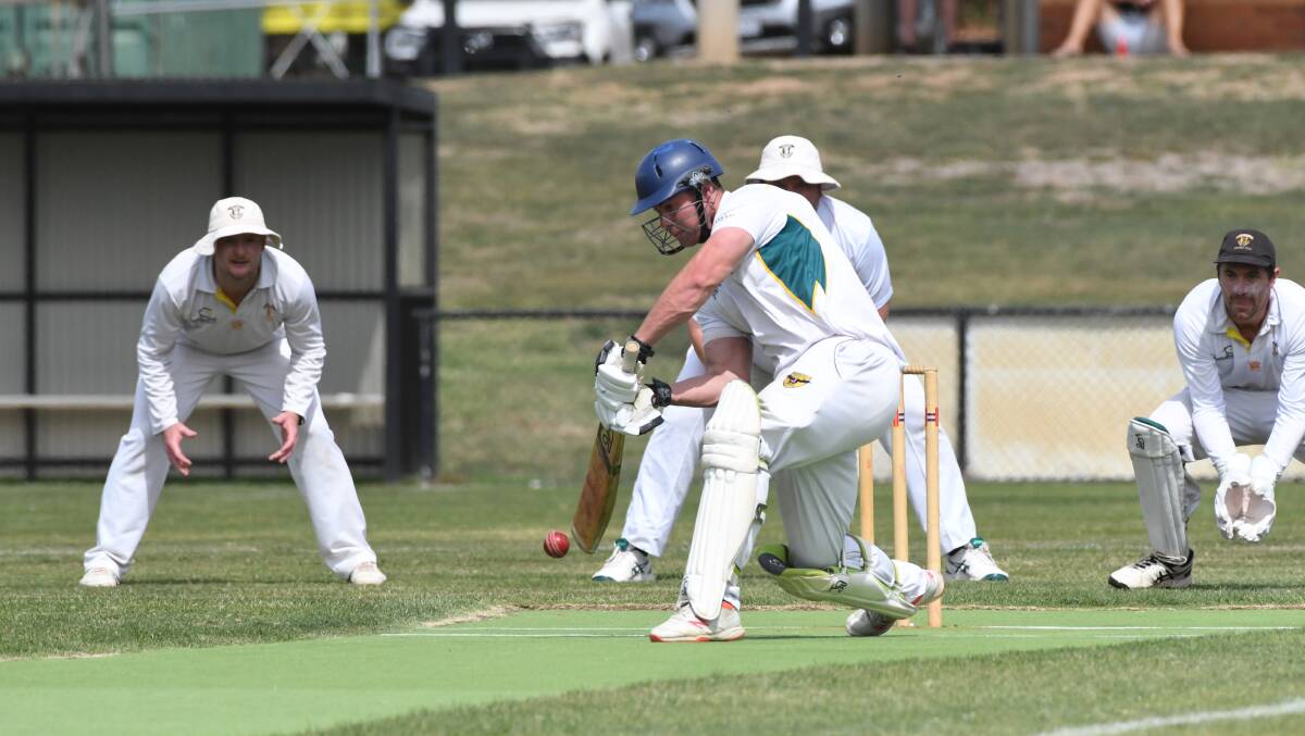 Spring Gully's Jesse Marciano plays a cover drive on his way to 52 on day two of the EVCA grand final. Pictures by Noni Hyett