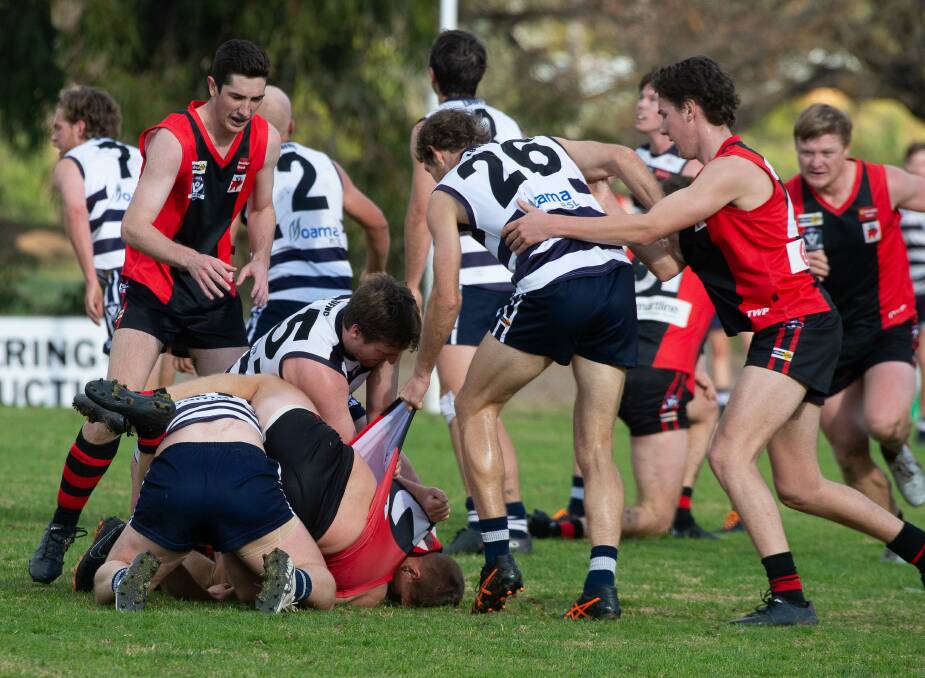 There was no love loost between the Cats and the Demons on Saturday. Picture: PETER WEAVING