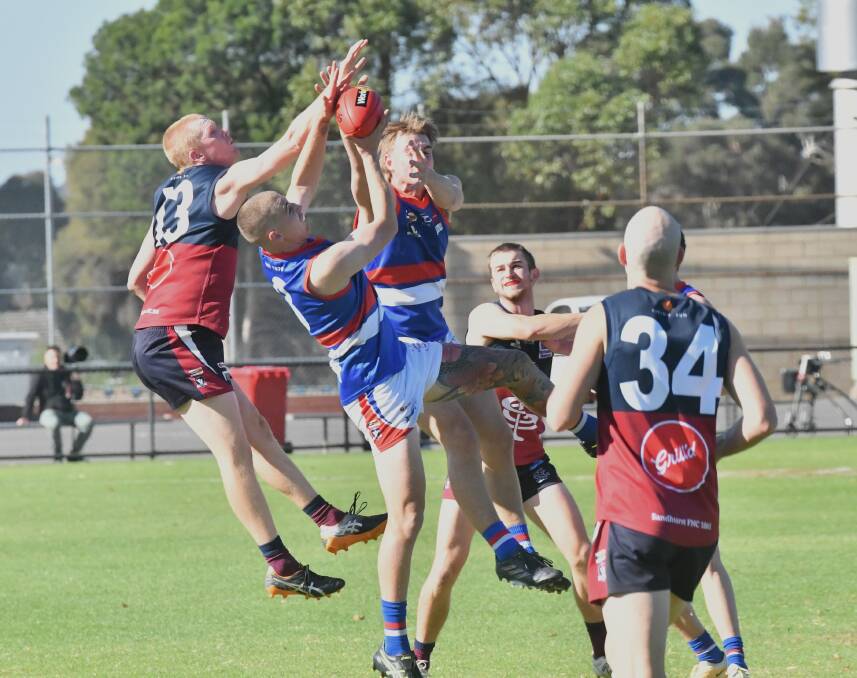 Gisborne forwards Jack Scanlon and Zac Denahy stretched the Sandhurst defence on Saturday. Picture by Darren Howe
