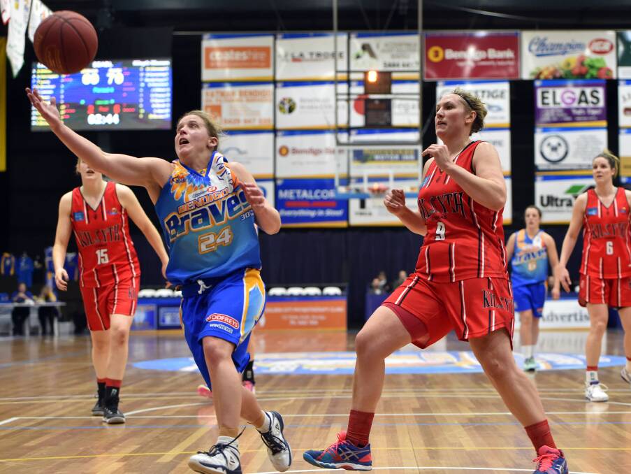 GUTSY: Bendigo Lady Braves guard Jane Chalmers chases down the loose ball in front of Kilsyth's Sarah Parsons. Picture: JODIE WIEGARD