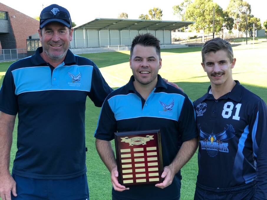HAPPY HAWKS: Eaglehawk coach Matt White, skipper Cory Jacobs and centurion Russell Stockdale with the West Family Perpetual Shield.