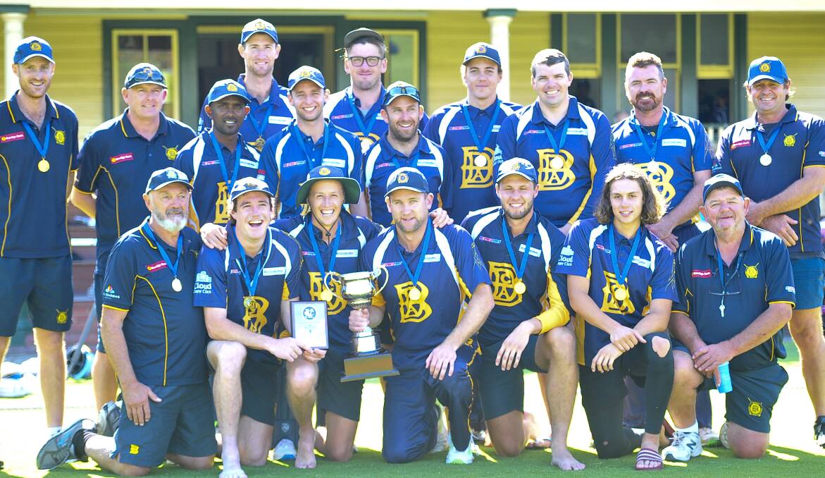 WINNERS ARE GRINNERS: The BDCA playing group and coaching staff after winning the 2020 Melbourne Country Week Provincial title.