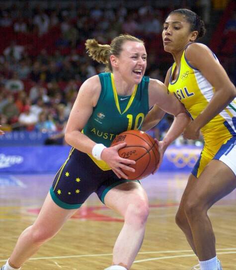 AGGRESSIVE: Kristi Harrower attacks the basket against Brazil at the Sydney Olympics.