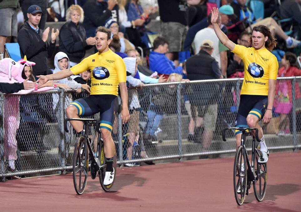 Sam Welsford and Kelland O'Brien salute the crowd after their Bendigo International Madison triumph. Picture: GLENN DANIELS