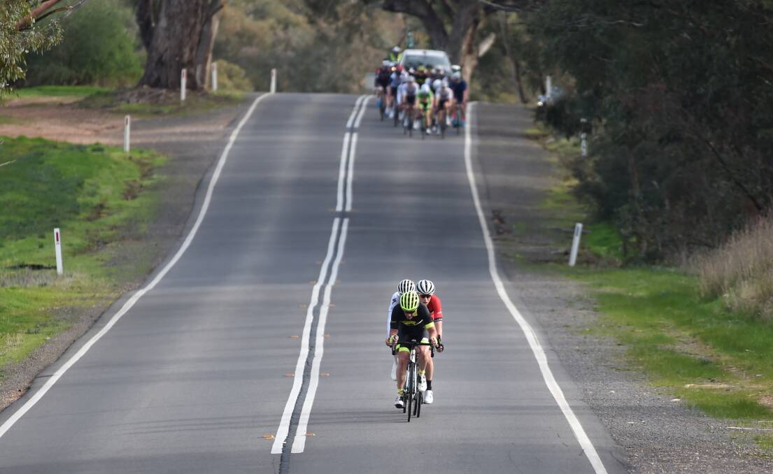 BREAKAWAY: Trent Stevenson, Jarrad Drizners and Nick Simpson surge clear of the peleton in Sunday's third stage. Picture: GLENN DANIELS