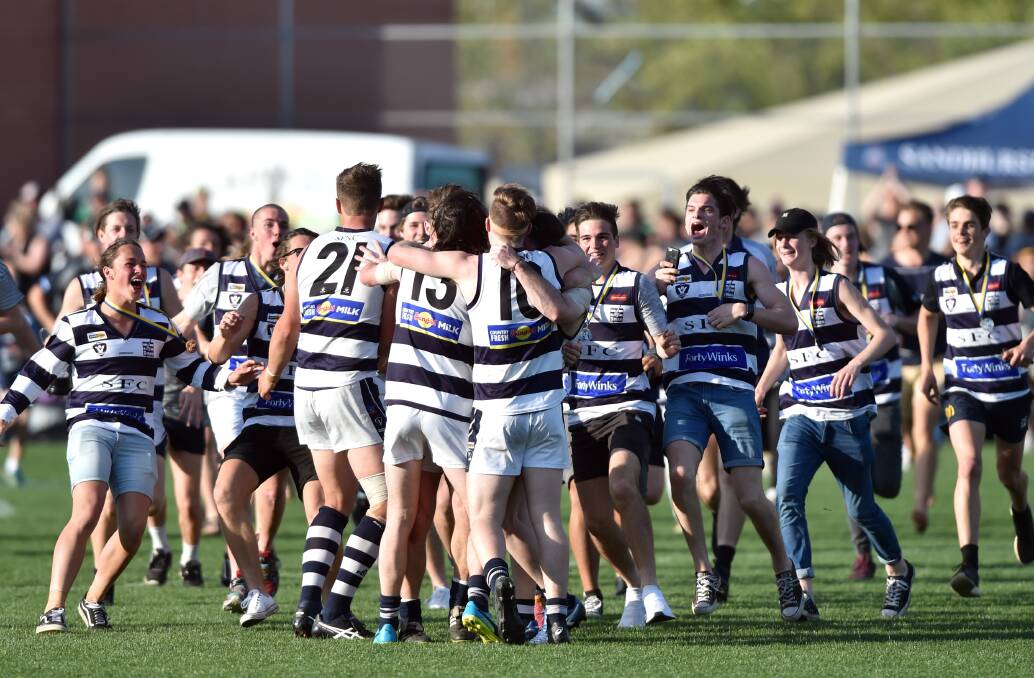 Strath Storm players and fans celebrate after the final siren. Picture: GLENN DANIELS