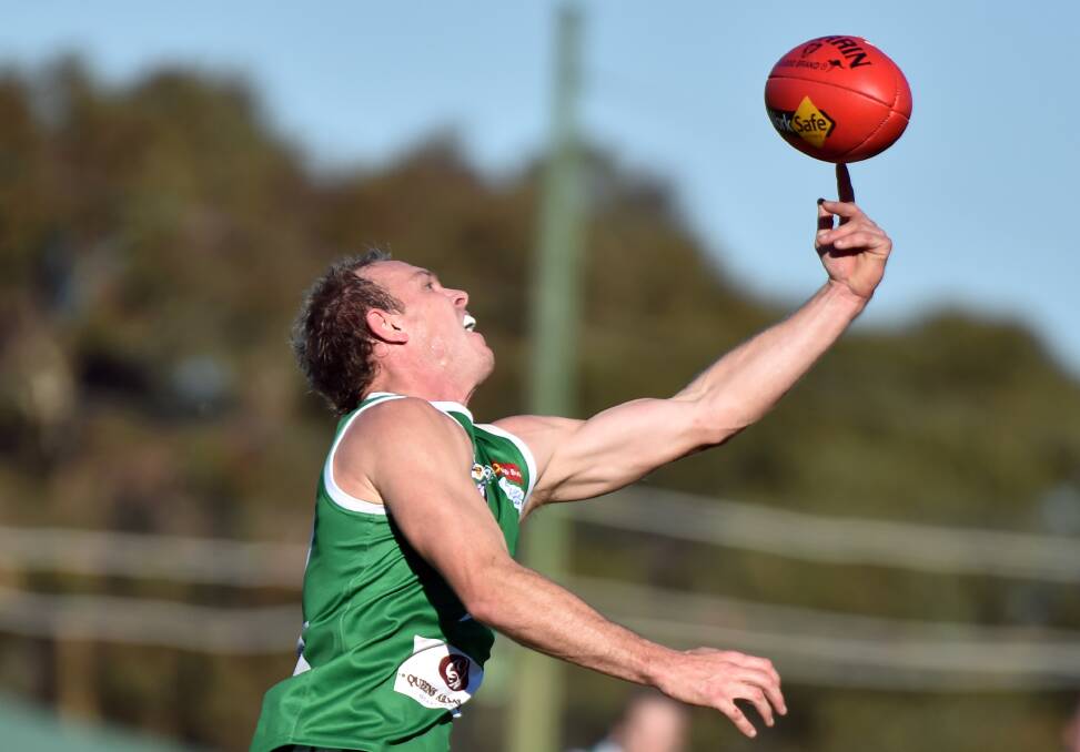 Kangaroo Flat's Hayden Pyke shows some skills to reel in the ball. Picture: GLENN DANIELS