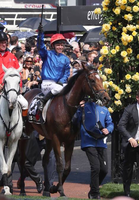 Kerrin McEvoy salutes the crowd. Picture: AAP