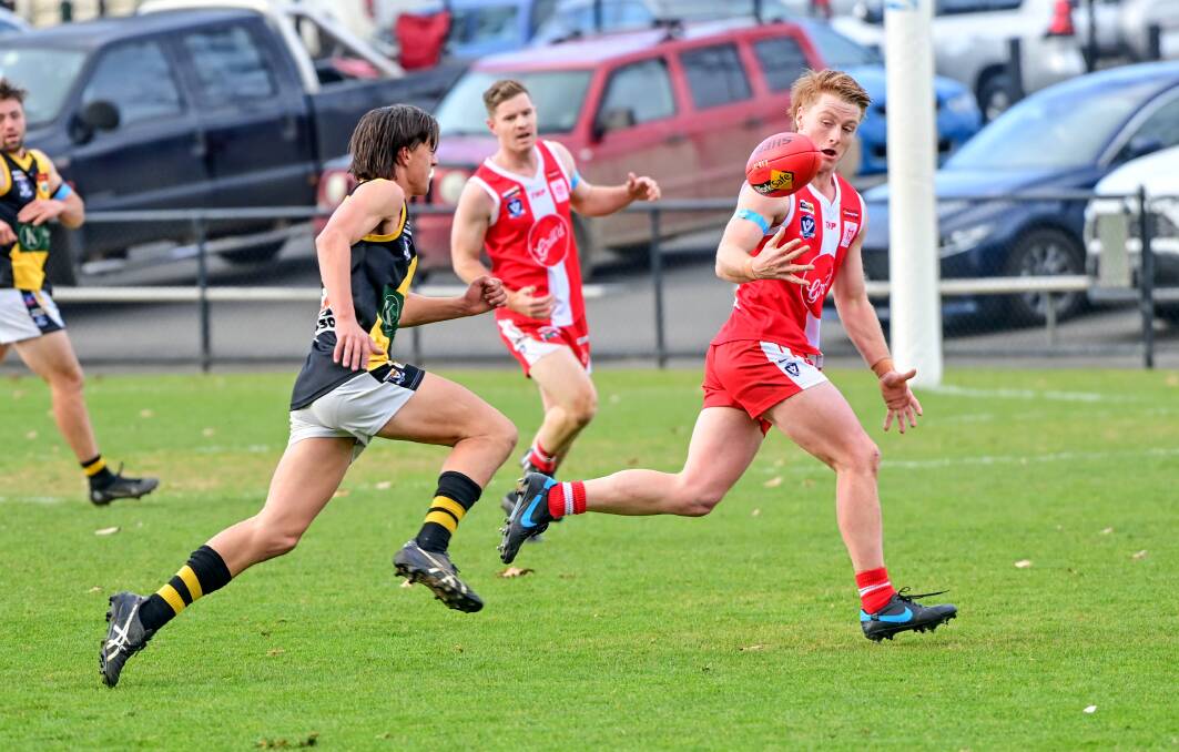 GOOD DAY: South Bendigo forward Will Keck leads the race for the ball in the Bloods' win over Kyneton. Keck kicked four goals and was one of South's best players. Pictures: BRENDAN McCARTHY