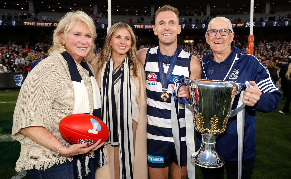 Maree, Brit, Joel and Bryce Selwood with the AFL premiership cup. Picture by Getty Images