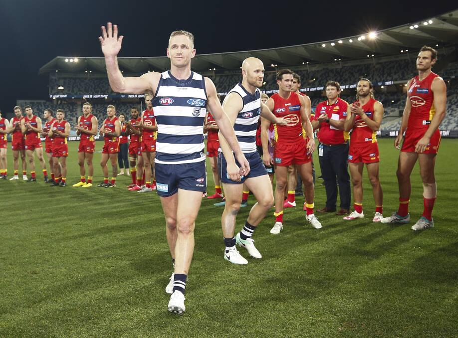 Joel Selwood and Gary Ablett Jr after their 300th and 350th AFL matches respectively. Picture: GETTY IMAGES