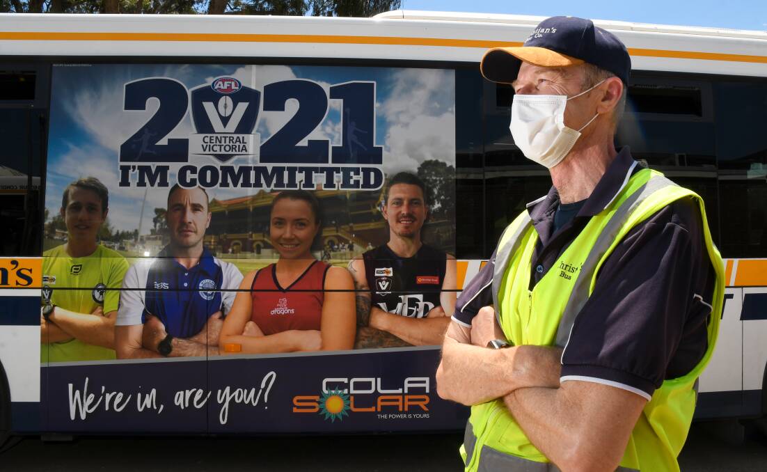 LOCAL SUPPORT: Christian's Bus Company's Steve Ling outside one of the two new buses that will promote AFLCV's "I'm Committed" campaign. Picture: NONI HYETT
