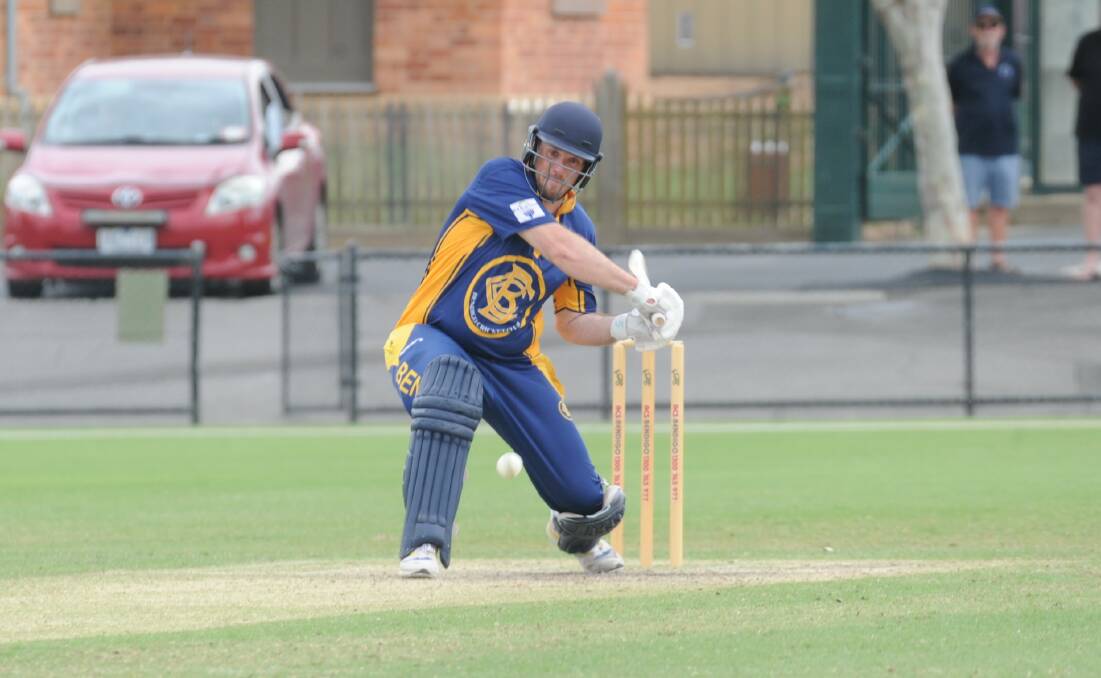 Kyle Humphrys belts a six over mid-wicket on his way to 121. Picture: ADAM BOURKE