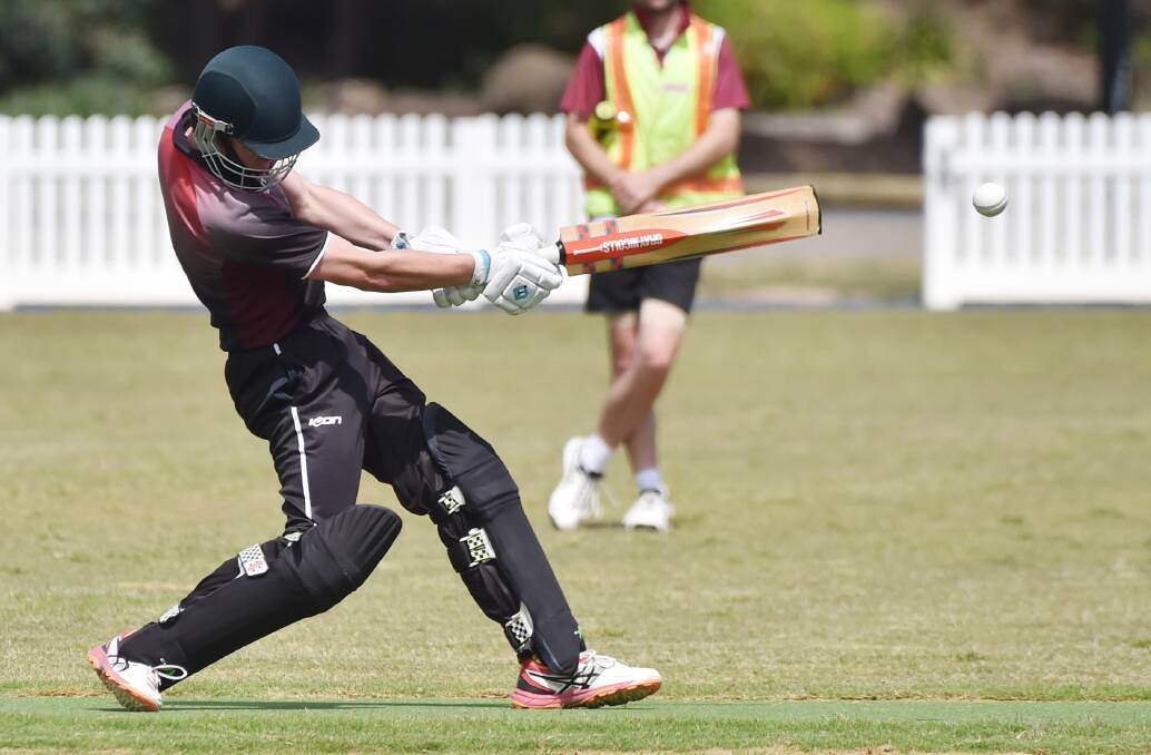 POWER PLAY: West Bendigo tailender Shannon Murphy tries to hit the boundary. Pictures: DARREN HOWE