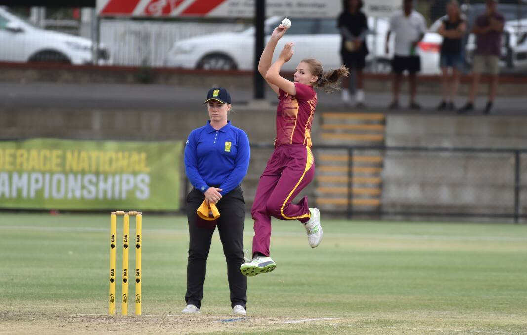 Kirsten Davey bowls for Queensland in the T20 grand final. Picture: GLENN DANIELS