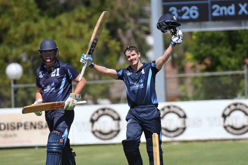 Russell Stockdale salutes his team-mates after scoring his first century for Eaglehawk. Picture: NONI HYETT