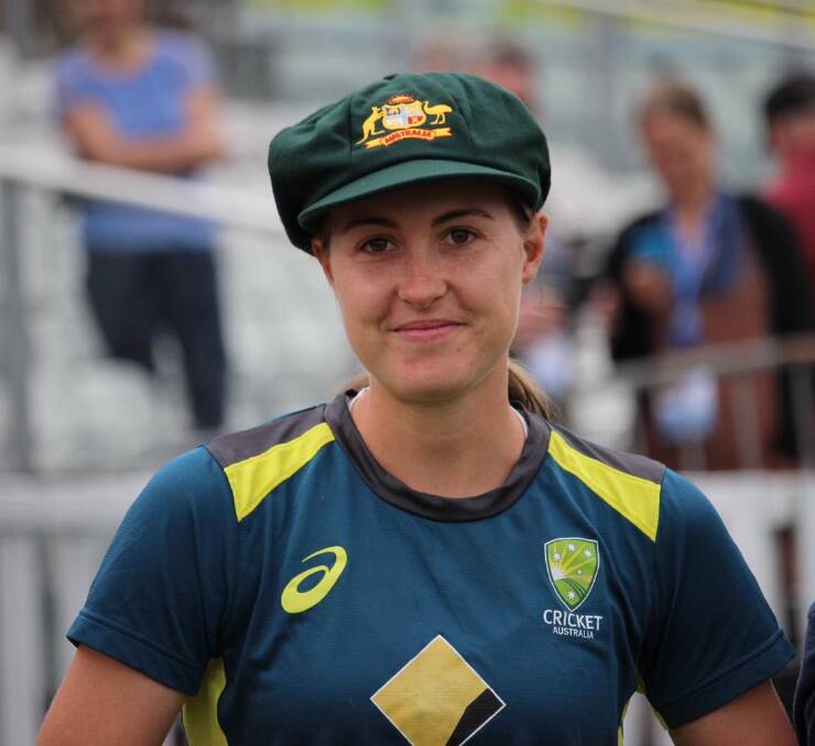 Tayla Vlaeminck after being presented with her Baggy Gren cap. Picture: CRICKET AUSTRALIA