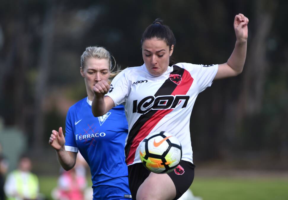 ATTACKING PLAY: Action from the La Trobe University and Strathdale women's match at Beischer Park on Sunday. Pictures: GLENN DANIELS