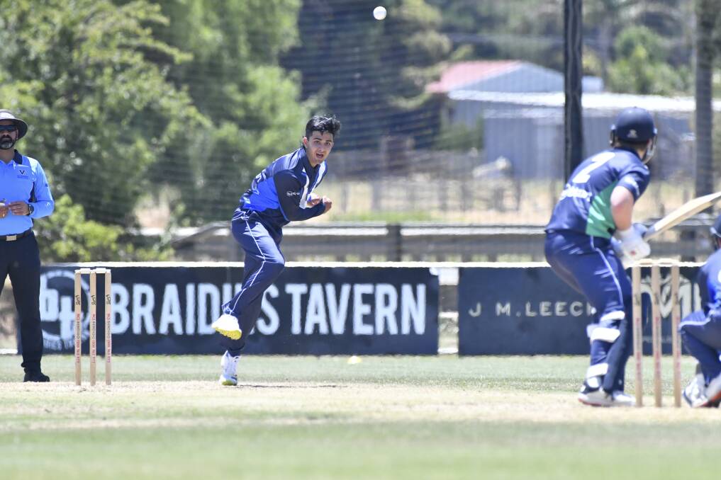 Vic Metro's Arjun Sehrawat bowls against Vic Country. Picture: NONI HYETT