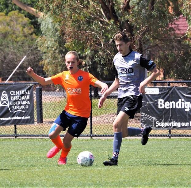 WELL PLAYED: Carlo Davies defends for Bendigo City. Picture: CONTRIBUTED