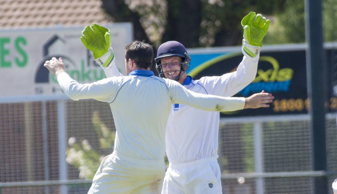 Ryan Hartley celebrates a wicket with Square skipper Ben Gunn in the semi-final win over Strathdale. Picture: DARREN HOWE