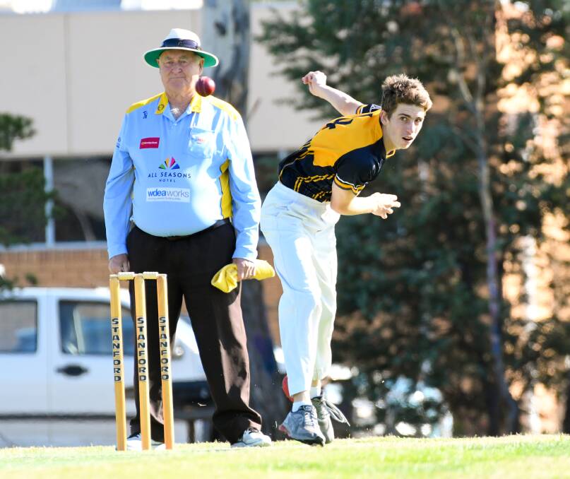 Jack Keating bowls for Catherine McAuley College against St Joseph's College. Picture: NONI HYETT