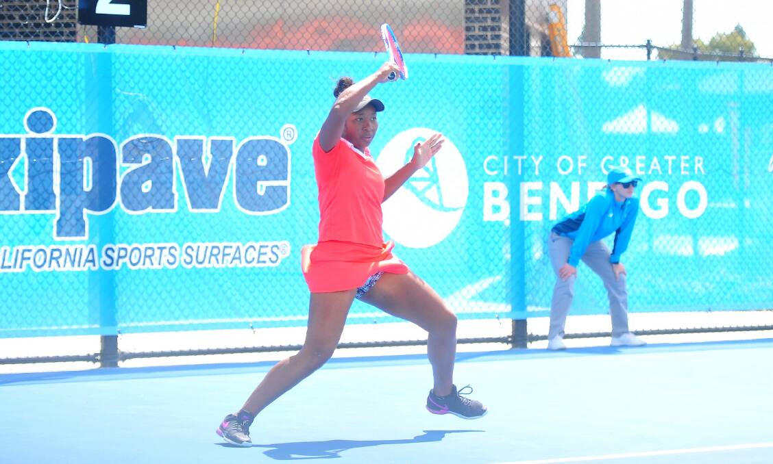 PNG's Abigail Tere-Apisah slams a forehand on her way to an upset win over Arina Rodionova.