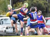 Eaglehawk and North Bendigo did battle in the BJFL under-12E division. Pictures: DARREN HOWE