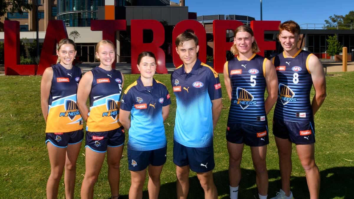 Bendigo Pioneers players display the club's new designs - Bryde O'Rourke, Lou Painter (home jumpers), Lila Keck, Billy Meade (new polo shirts), Harley Reid, Malik Gordon (away jumpers). Picture by Noni Hyett