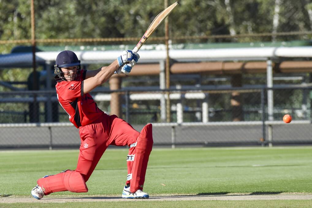 Zane Keighran belts a boundary on his way to a match-winning 93 for Bendigo United in the BDCA T20 grand final. Picture: DARREN HOWE